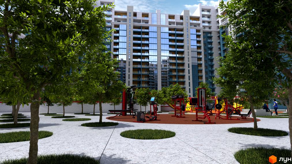 Висотна будівля ЖК Національний з великою кількістю вікон. На території комплексу розташований спортивний майданчик з тренажерами та зелені насадження.