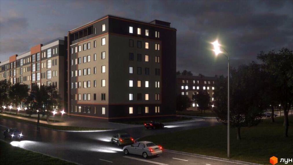 Зображення Житлового комплексу Парковий квартал вночі. Багатоповерховий будинок з освітленими вікнами та прилегла територія з дорогою.