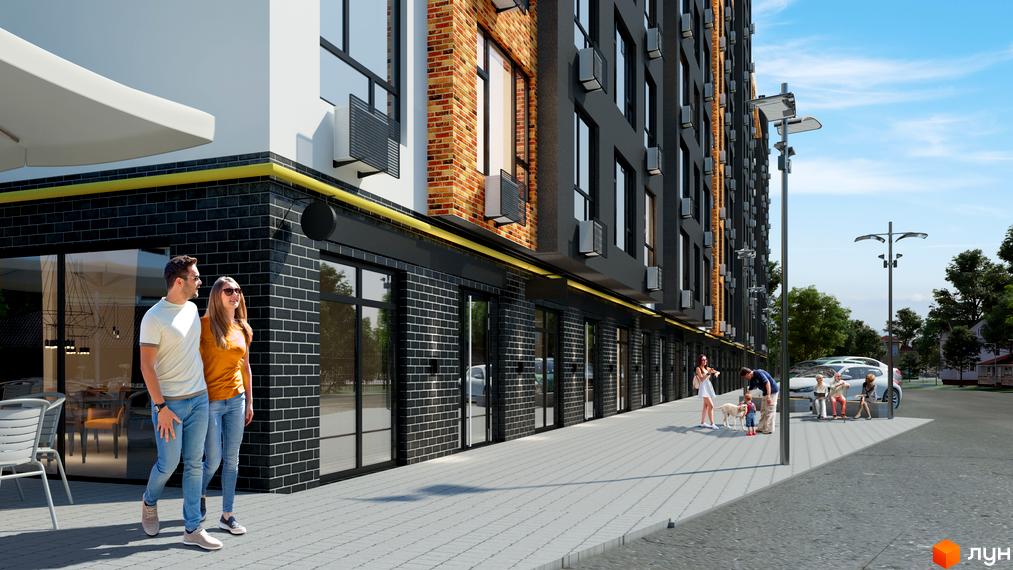 Зображення фасаду та прибудинкової території Житлового комплексу Graphite. На передньому плані пара людей, далі - відпочиваючі.