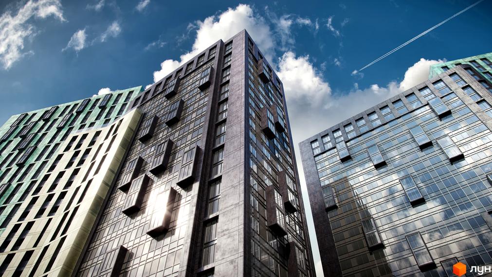 Житловий комплекс Greenville Park: фасади будівель з панорамними вікнами та виступаючими елементами під блакитним небом з хмарами.