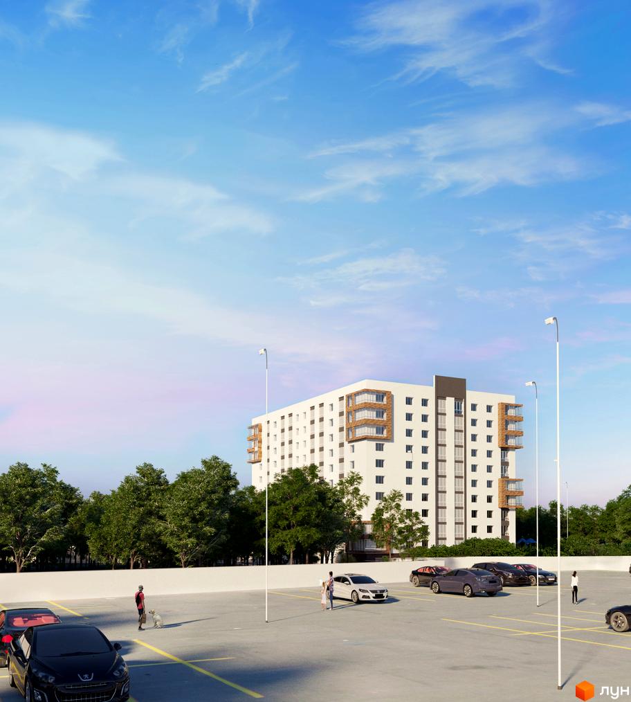 Житловий комплекс Олімпійський 2: білий багатоповерховий будинок з коричневими балконами, перед яким розташований паркінг з автомобілями та зелені дерева.