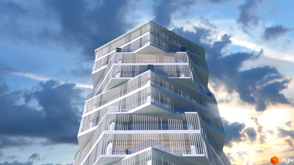 Житловий комплекс 5th Avenue — будівля з оригінальним спіральним фасадом та балконами, що вирізняється на тлі хмарного неба.