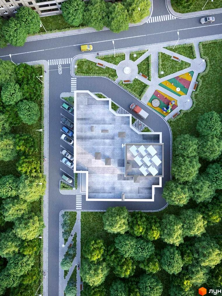 Житловий комплекс Cascade house з висоти пташиного польоту. Сучасна архітектура будівлі та доглянута прибудинкова територія з дитячим майданчиком та зонами відпочинку.