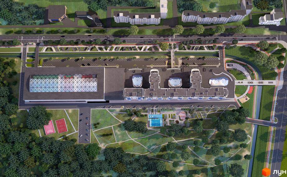 Зображення зверху на Житловий район Sportcity з дахами, паркінгом та зеленим парком з басейном. Вид на прибудинкову територію.