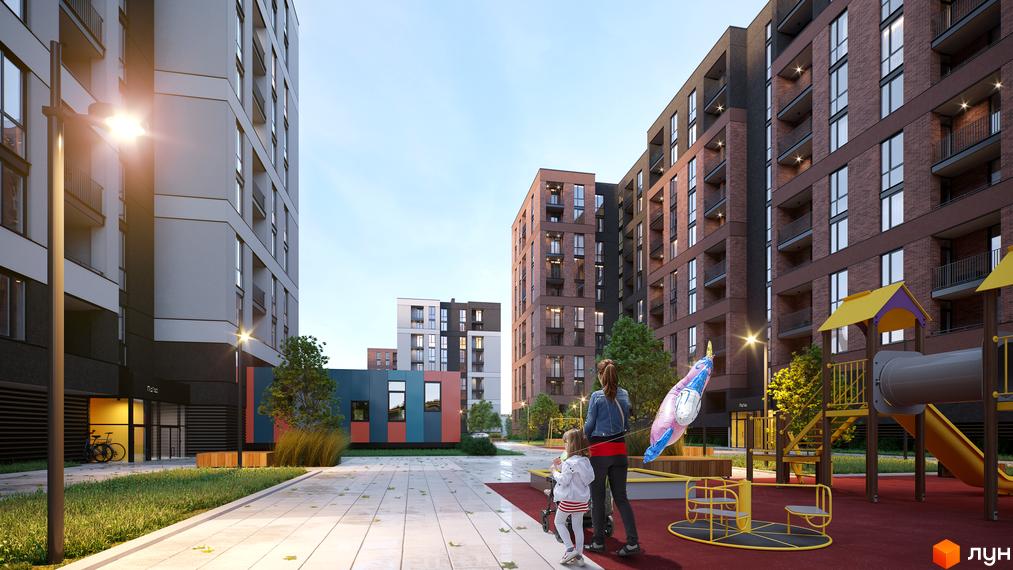 Вигляд на житловий комплекс Avalon Zelena Street з облаштованим подвір'ям та дитячим майданчиком. Багатоповерхові будинки з цегляним фасадом.