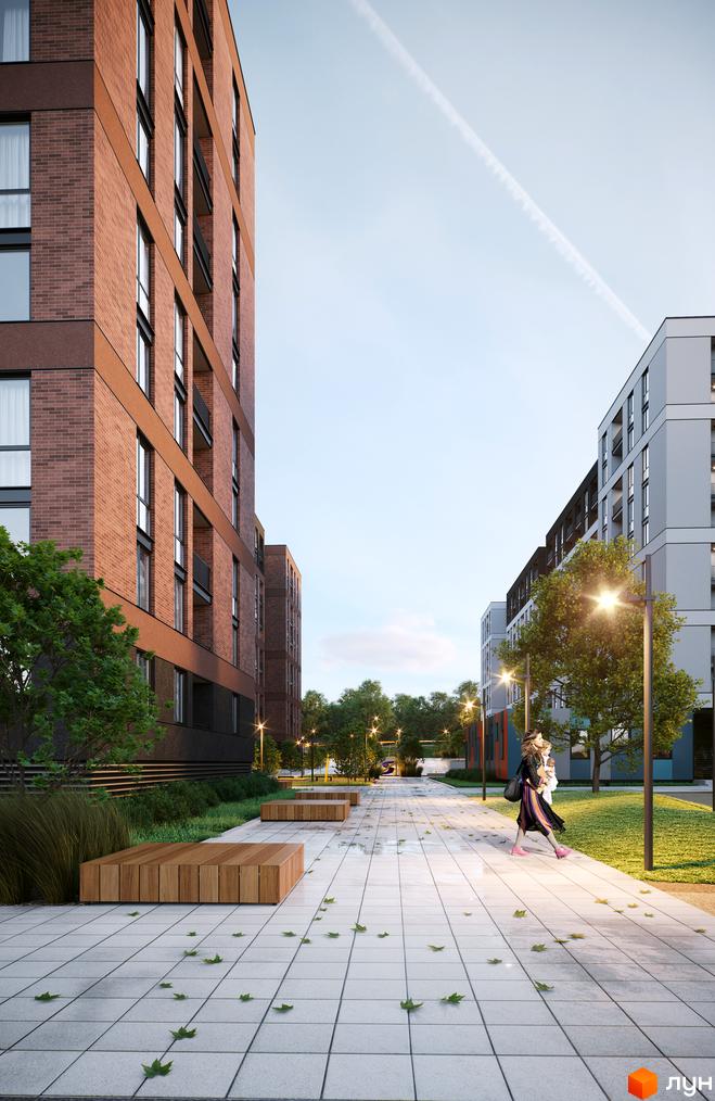 Житловий комплекс Avalon Zelena Street: фасади будинків з цегли, тротуарна плитка, лавки та зелені насадження на території.