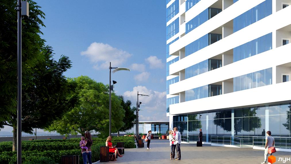 Житловий комплекс Новокодацькi Вежi: багатоповерховий будинок з білим фасадом, великими вікнами. Прибудинкова територія з зеленню та доріжками.