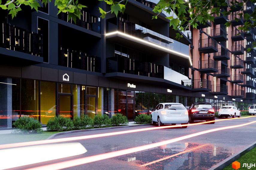 Зовнішній вигляд новобудови ЖК Avalon з темним фасадом та скляними балконами. Перед комплексом розташована дорога з автомобілями та зелені кущі.