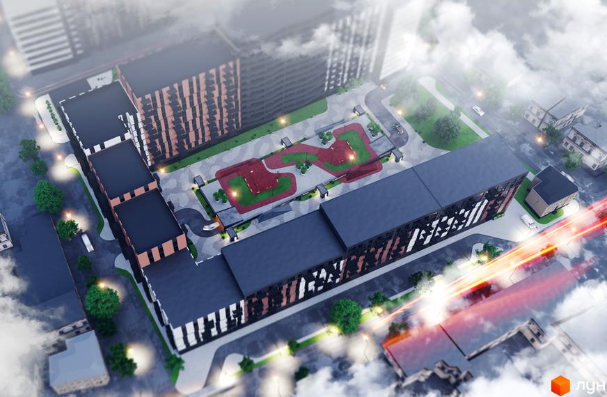 Житловий комплекс Avalon: вид зверху на будівлі з темними фасадами та оранжевими вставками, внутрішній двір з дитячим майданчиком та зеленими зонами.