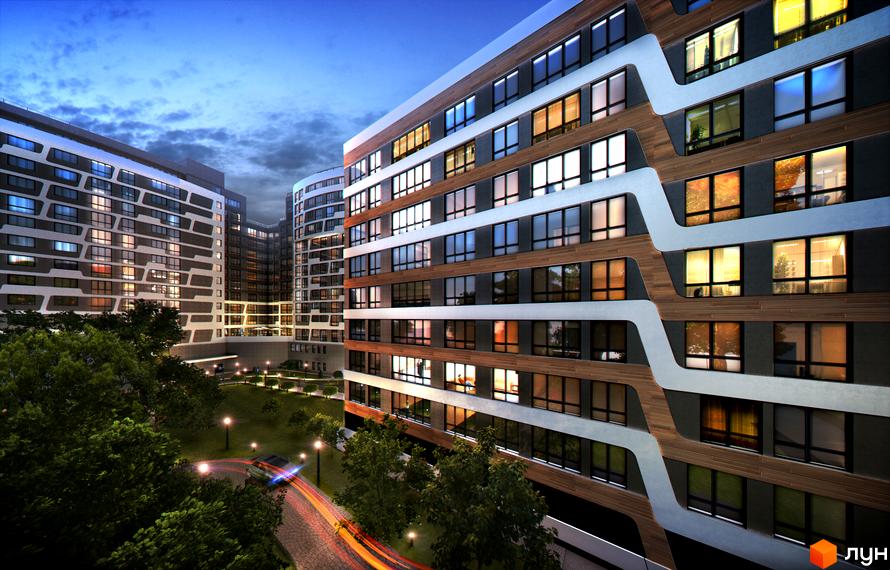 Зображення фасаду Житлового комплексу Парус Life з великими вікнами та прибудинковою територією з деревами. Вигляд новобудови ввечері.