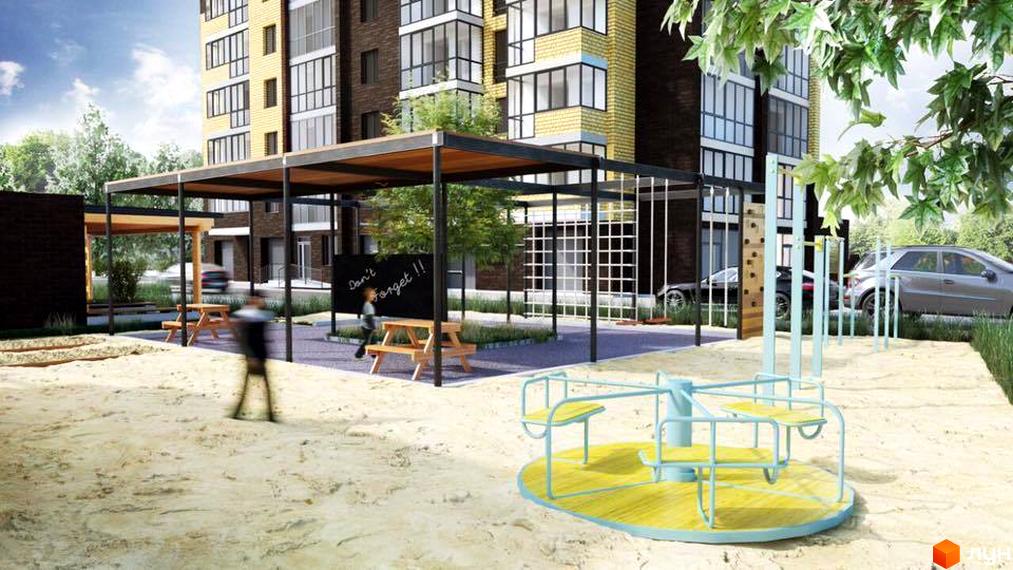 Житловий комплекс Parthenon. На фото зображено сучасну будівлю з великими вікнами та прибудинкову територію з дитячим майданчиком.