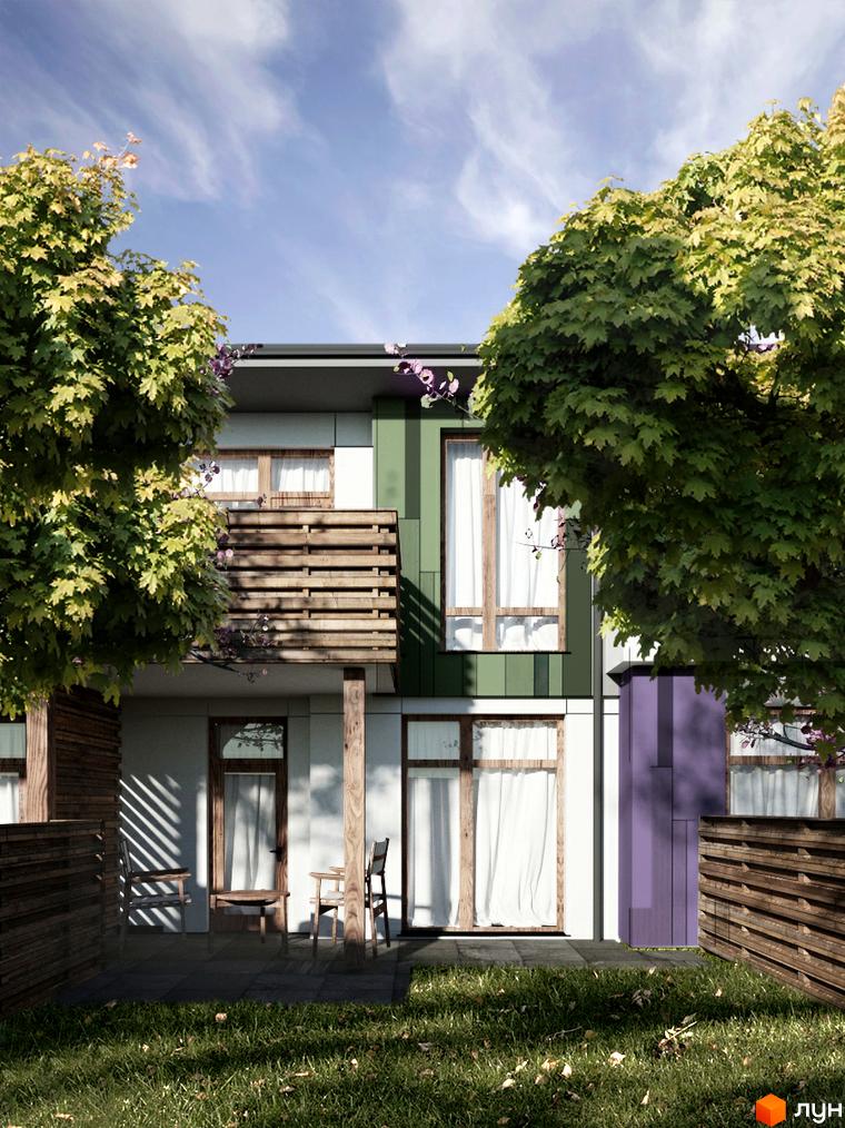 Котеджне містечко Палітра: двоповерховий будинок з зеленими та фіолетовими фасадами, дерев'яним балконом та прибудинковою територією з газоном та парканом.
