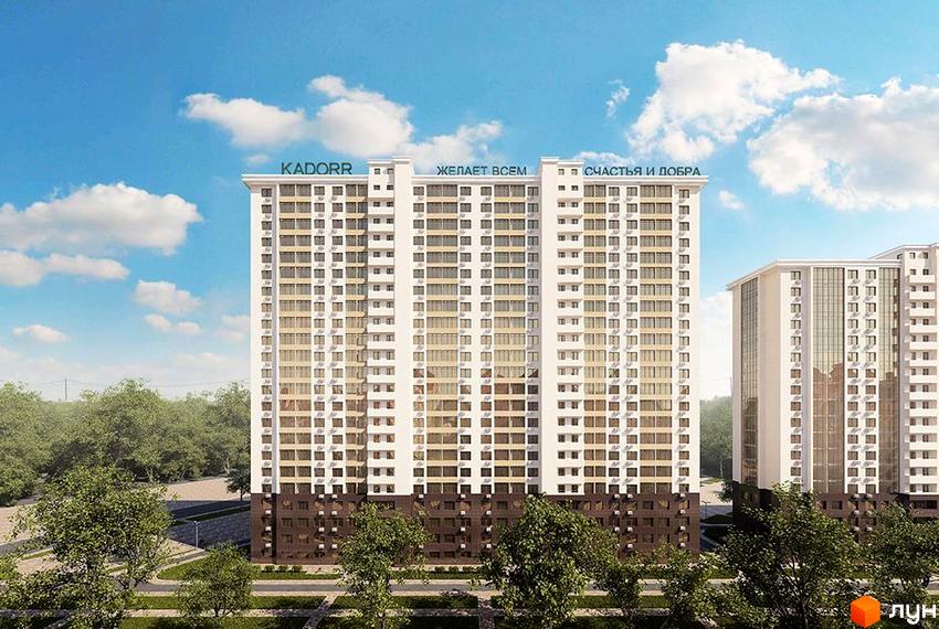 Новобудова KADORR з великою кількістю вікон та кондиціонерів, що розташована серед зелених дерев та доглянутої території.