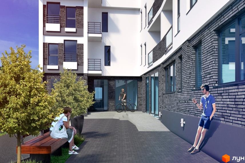 Зовнішній вигляд житлового комплексу на вул. Богдана Хмельницького, 109, з цегляним фасадом та балконами. На прибудинковій території є лавка та дерева.