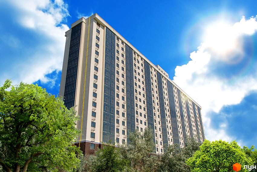 Новобудова Двадцята Перлина: багатоповерховий житловий будинок світлого кольору з темними вікнами, розташований серед зелених дерев під яскравим небом.