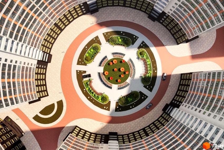 Вид зверху на житловий комплекс Сорок третя перлина з унікальною круговою архітектурою та зеленим внутрішнім двором. Огляд фасаду будівель та ландшафтного дизайну території.