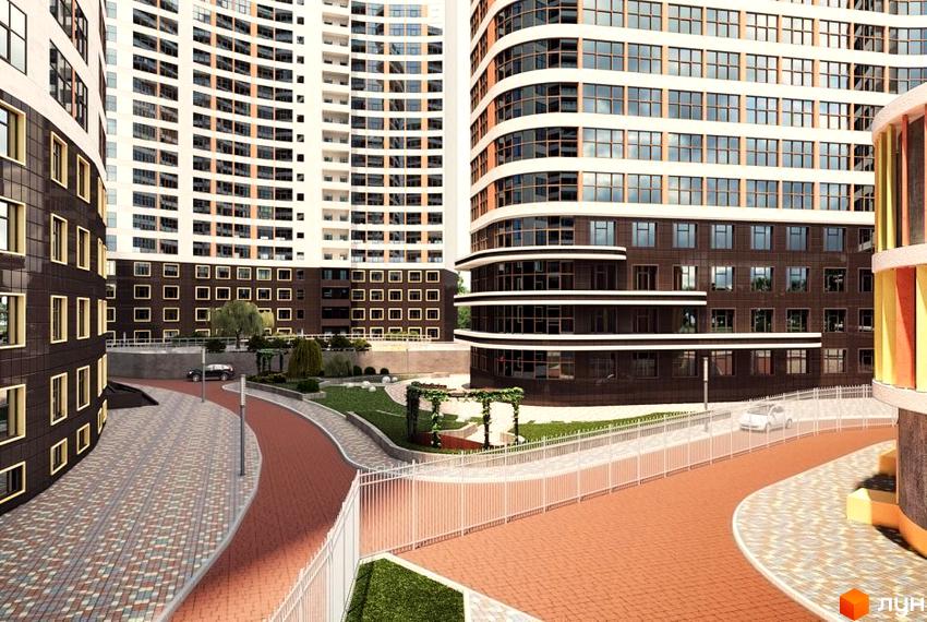 Зовнішній вигляд житлового комплексу Сорок третя перлина з високими будівлями та доглянутою прибудинковою територією з доріжками та зеленими зонами.