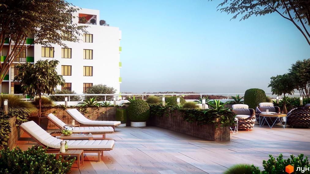 Житловий комплекс Харківський: біла багатоповерхова будівля з зеленими елементами та простора тераса з шезлонгами та зонами відпочинку.