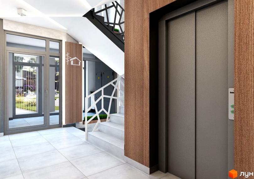 Сучасний вхід у житловий комплекс Басів схил з дверима та сходами. Прибудинкова територія з зеленню та парканом.