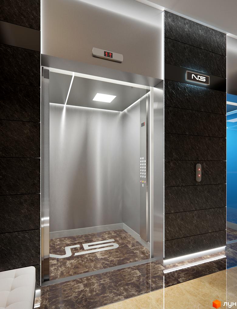 Інтер'єр ліфта та холу Житлового комплексу Новопечерський Квартал №5 з оздобленням під камінь, металевими панелями та логотипом NS на підлозі.