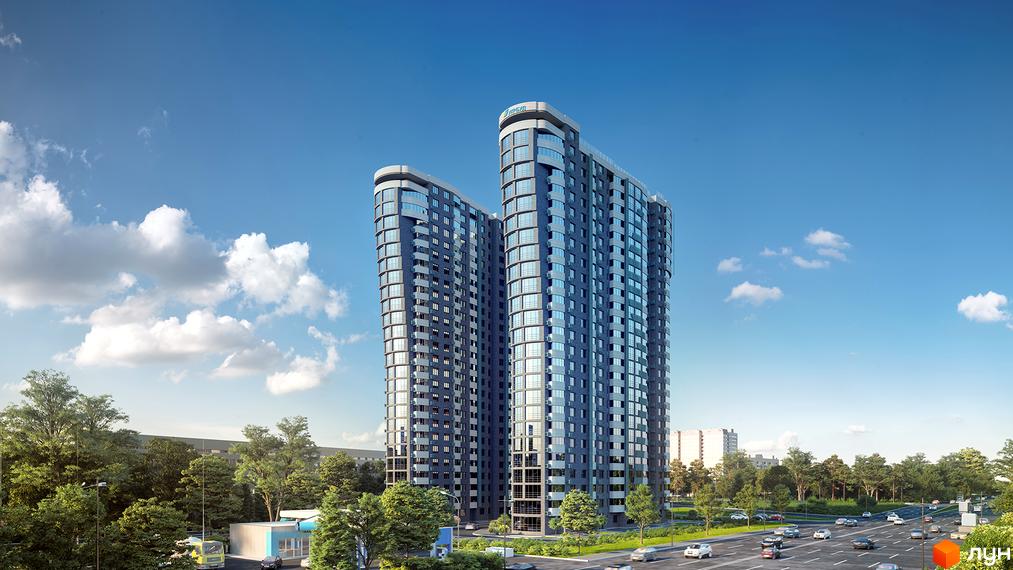 Високі будинки ЖК FREEDOM з панорамними вікнами. Поруч дорога з автомобілями та зелені насадження.