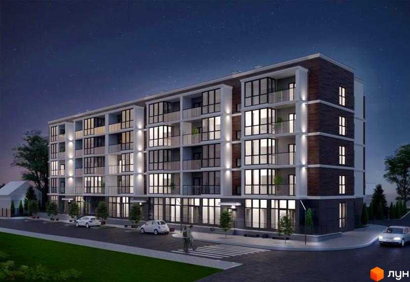 Клубний будинок „Сімейний“ вночі. Багатоквартирний будинок з балконами та великими вікнами, освітлений ліхтарями. Поруч дорога з автомобілями та пішохідний перехід.