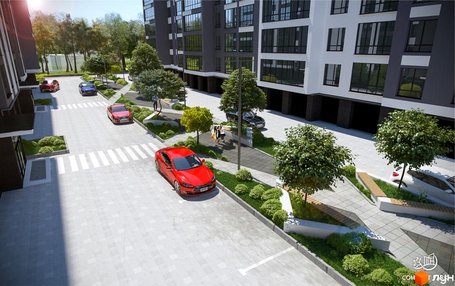Новобудова ЖК Comfort Park з автомобілями на парковці та зеленою зоною відпочинку. Зовнішній вигляд будинку та прибудинкової території.