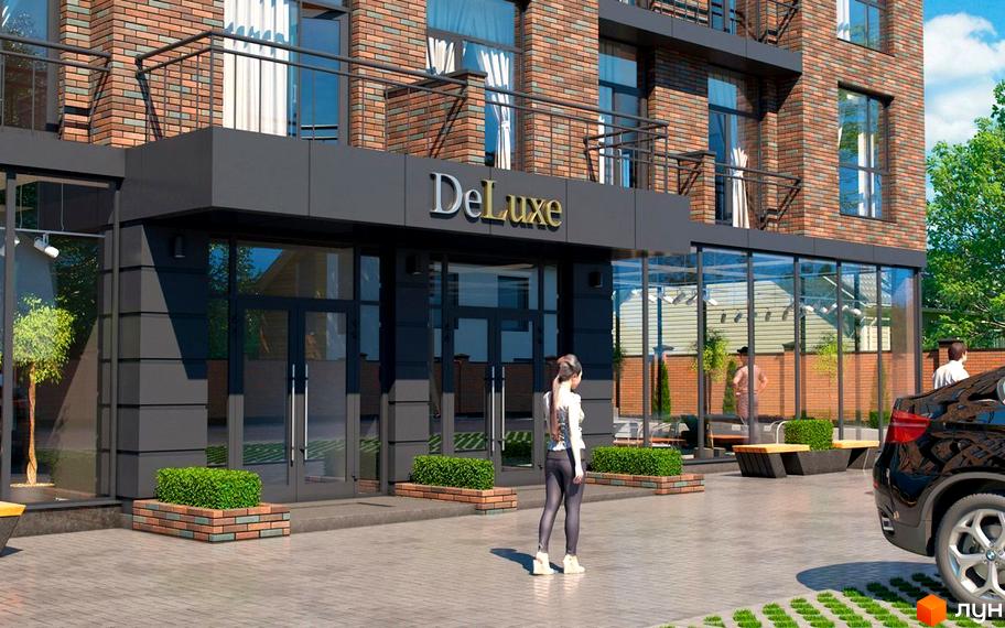 Клубний будинок Deluxe з цегляним фасадом та скляними елементами. Прибудинкова територія з кущами та лавками.