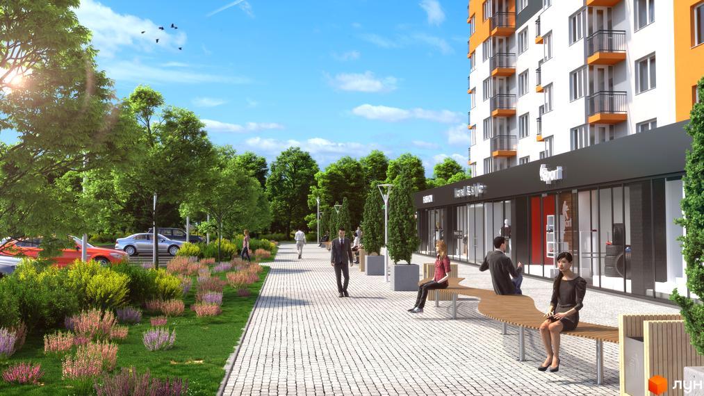 Житловий комплекс Сімейний COMFORT: сучасна новобудова з магазинами на першому поверсі та доглянутою прибудинковою територією з лавками та деревами.