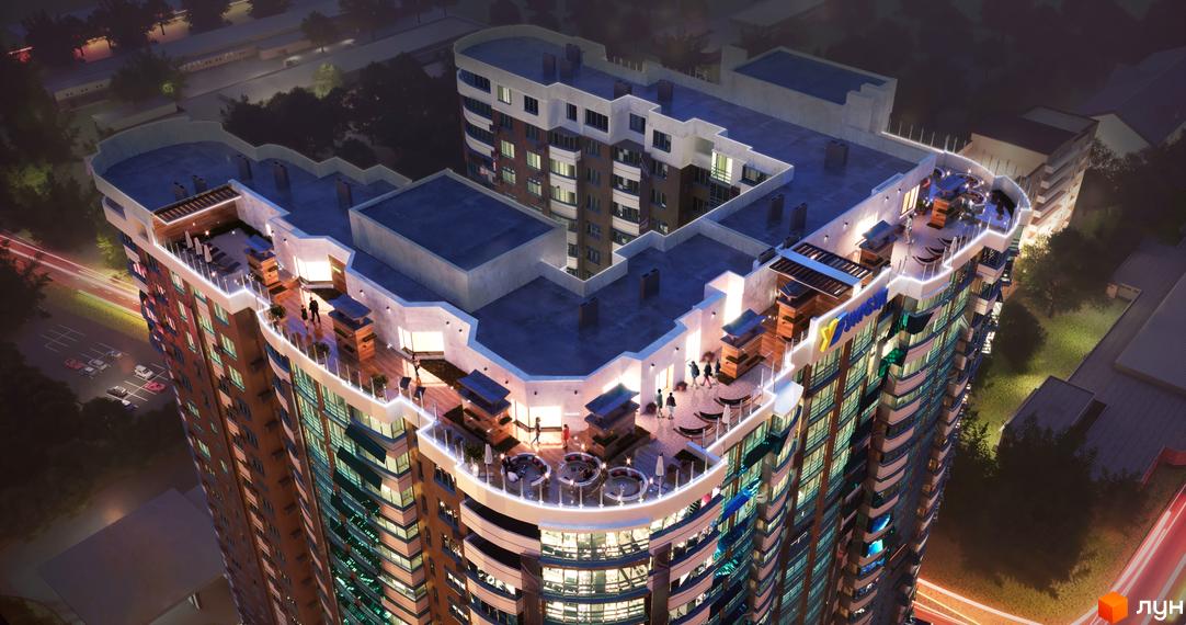 Зображення Житлового комплексу FREEDOM з терасою на даху. Вигляд зверху на багатоповерховий будинок з прибудинковою територією.