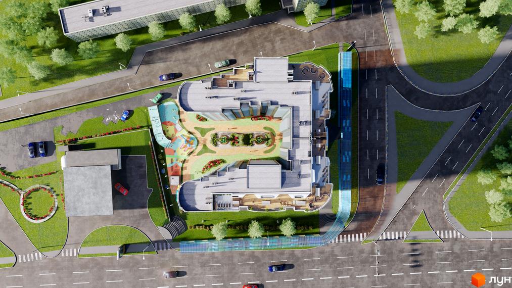 Вид зверху на Будівельний проєкт FREEDOM. Багатоповерховий будинок з плоским дахом та прибудинковою територією з дитячим майданчиком, газонами та деревами.