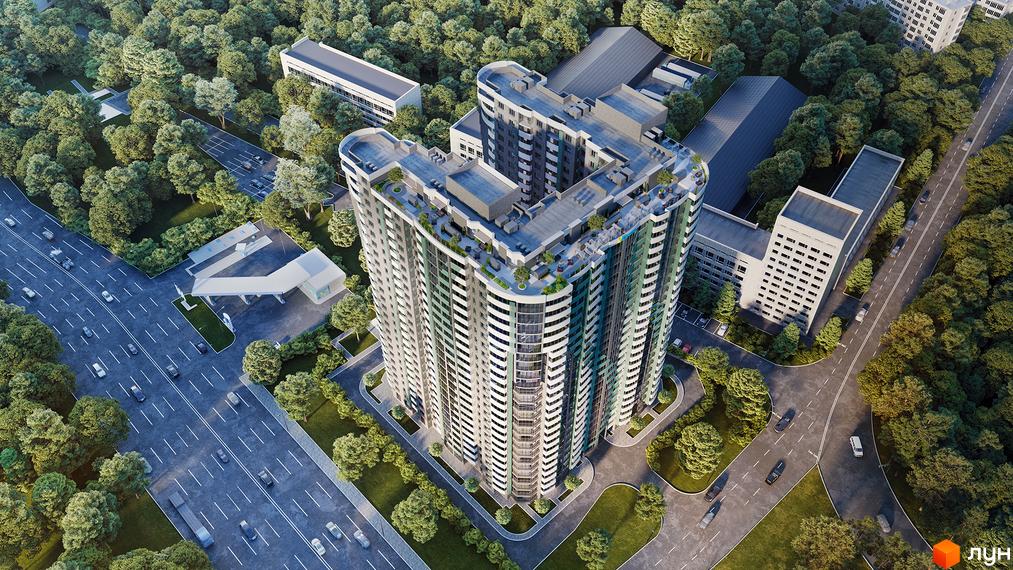 Житловий комплекс FREEDOM з висоти пташиного лету. Багатоповерхівка з великою прибудинковою територією, поруч ліс та дорога.