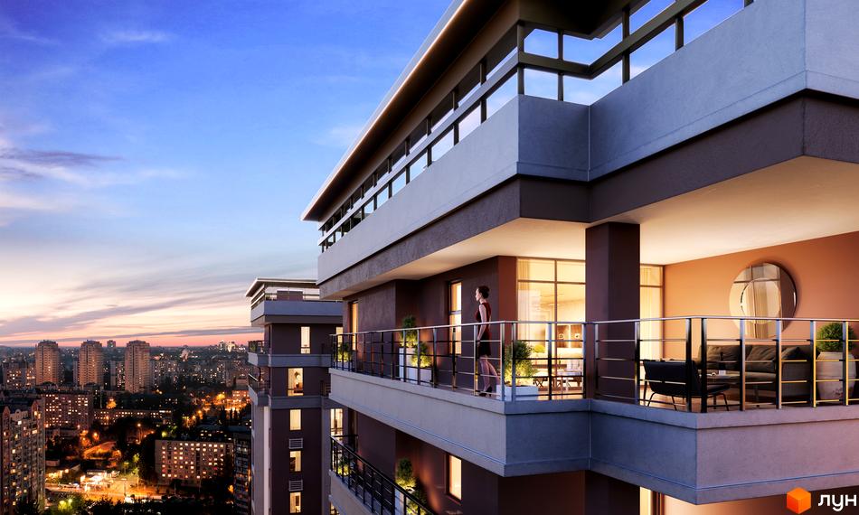 Житловий комплекс Adamant: вид з балкона на місто ввечері. Сучасна архітектура новобудови з панорамними вікнами та зручними терасами.