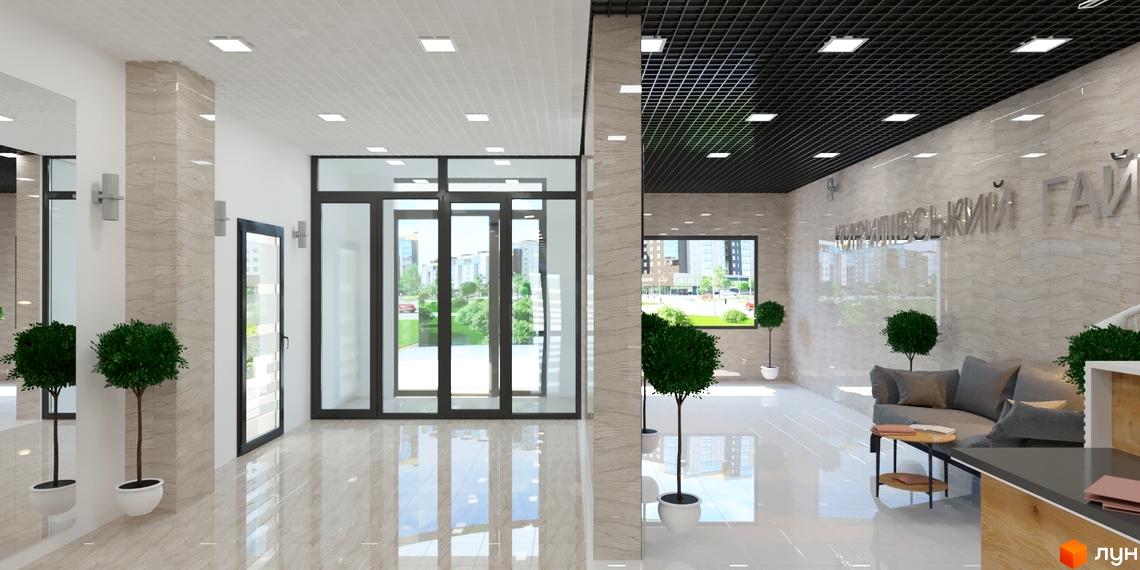 Просторе лобі Житлового комплексу Кирилівський Гай зі світлими стінами, глянцевою підлогою та чорною стелею. Великі вікна відкривають вид на зелену прибудинкову територію.