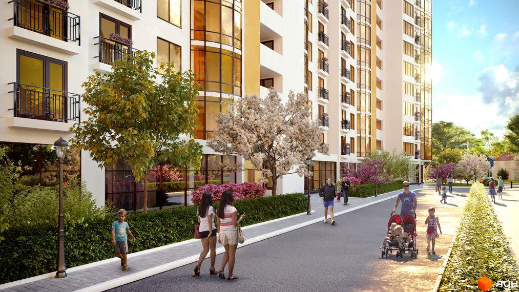 Житловий комплекс Lystopad: сучасна архітектура з великими вікнами та балконами. Доглянута прибудинкова територія з деревами та квітами, де гуляють люди.