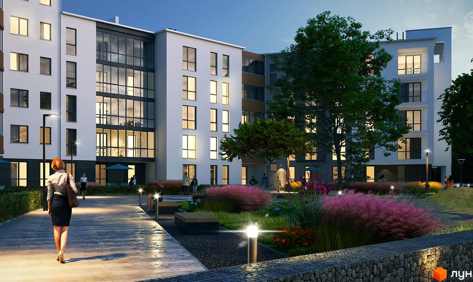 Житловий комплекс Сонячний квартал: фасади будівель з великими вікнами та балконами, освітлена прибудинкова територія з ландшафтним дизайном та зонами відпочинку.
