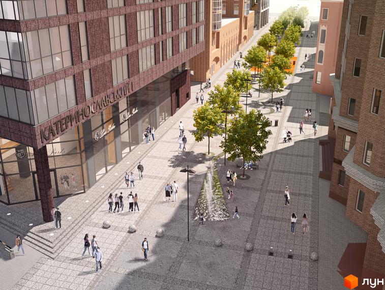 Житловий комплекс Катеринославський I. Архітектурний вигляд будівлі з великими вікнами та вхідною групою. На території комплексу розташовані алеї з деревами та фонтан.