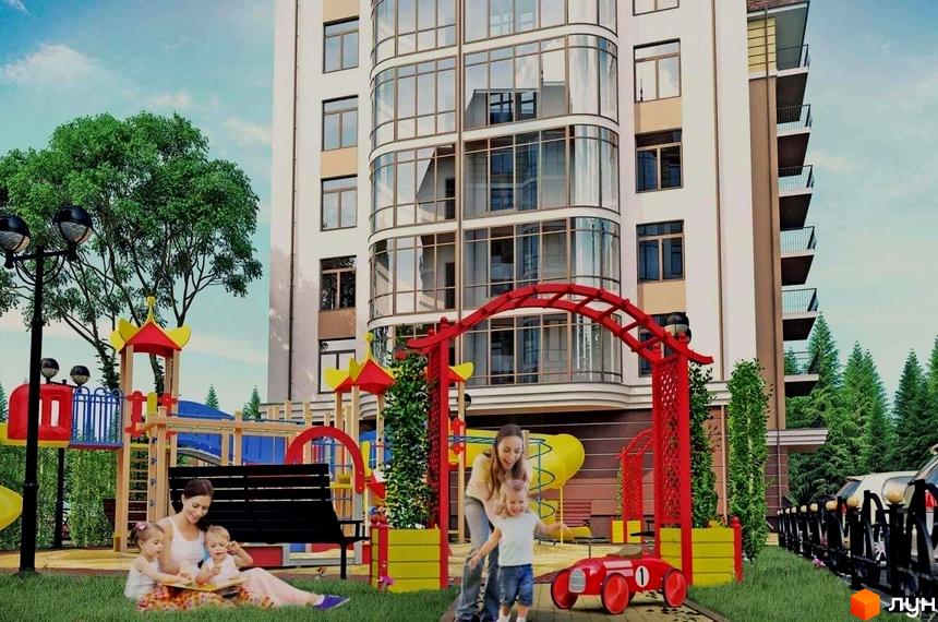 Висока будівля житлового комплексу з великими вікнами. На прибудинковій території дитячий майданчик, арка та зелені насадження.