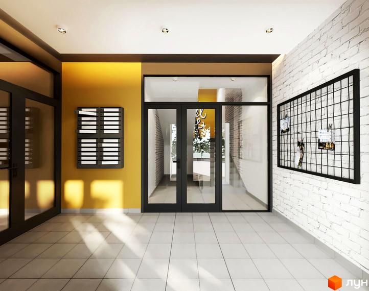 Вхідна група житлового комплексу Roland з поштовими скриньками та сіткою для оголошень на стіні з білої цегли. Оздоблення стін жовтою та коричневою фарбою.