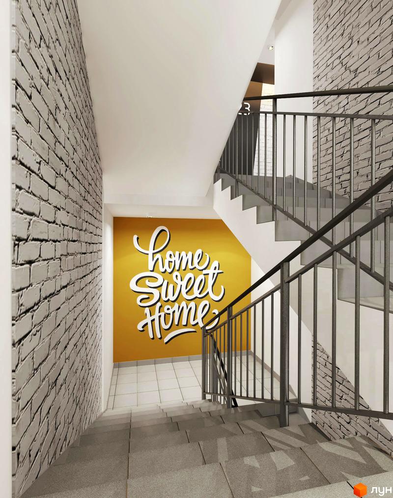 Інтер'єр сходової клітки житлового комплексу Роланд з написом 