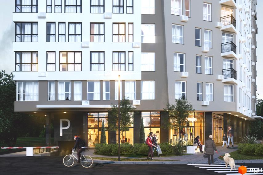 Житловий комплекс Роланд: фасади будівель з великою кількістю вікон та балконів, прибудинкова територія з деревами та людьми.