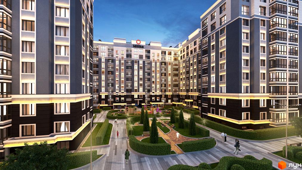 Житловий комплекс Idilika з багатоповерховими будинками темно-сірого та світлого кольорів, освітленими вікнами. На внутрішній території розташовані доріжки, зелені насадження та дитячий майданчик.