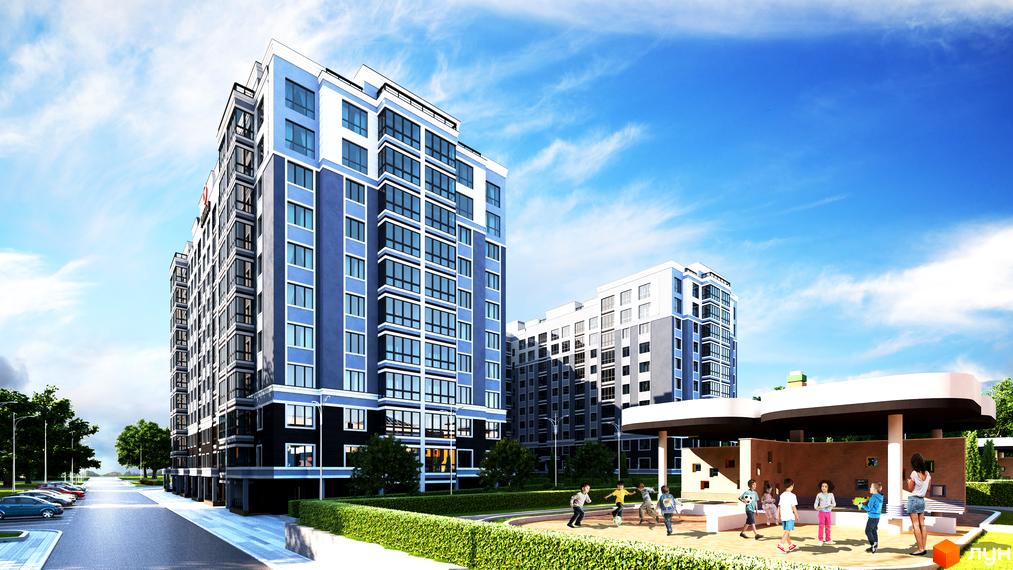 Новобудова Idilika з синьо-білими фасадами та великими вікнами. На території облаштований дитячий майданчик та паркінг.