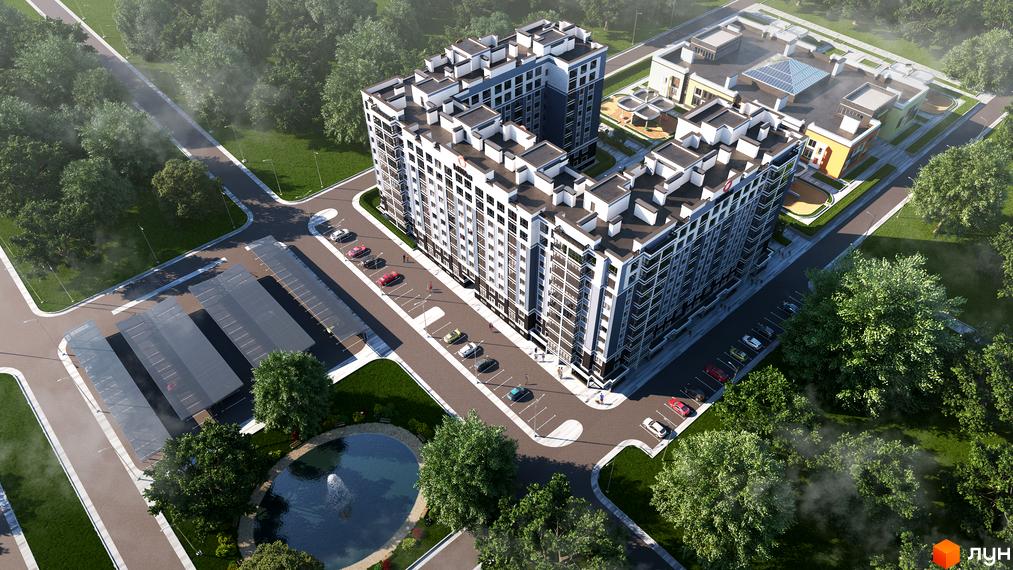 Житловий комплекс Idilika: багатоповерховий будинок з біло-темним фасадом. Навколо парковки, зелені зони, водойма з фонтаном та дитячий майданчик.