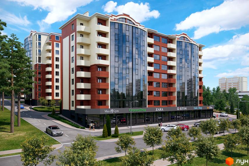 Зовнішній вигляд ЖК Оберіг: багатоповерховий будинок з червоно-білими фасадами та скляною центральною частиною. Навколо будинку зелена територія з деревами та дорогою.