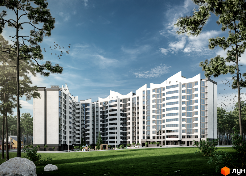 Зображення фасаду Житлового комплексу Авіатор з великими вікнами та білим оздобленням. На передньому плані зелений газон та дерева.
