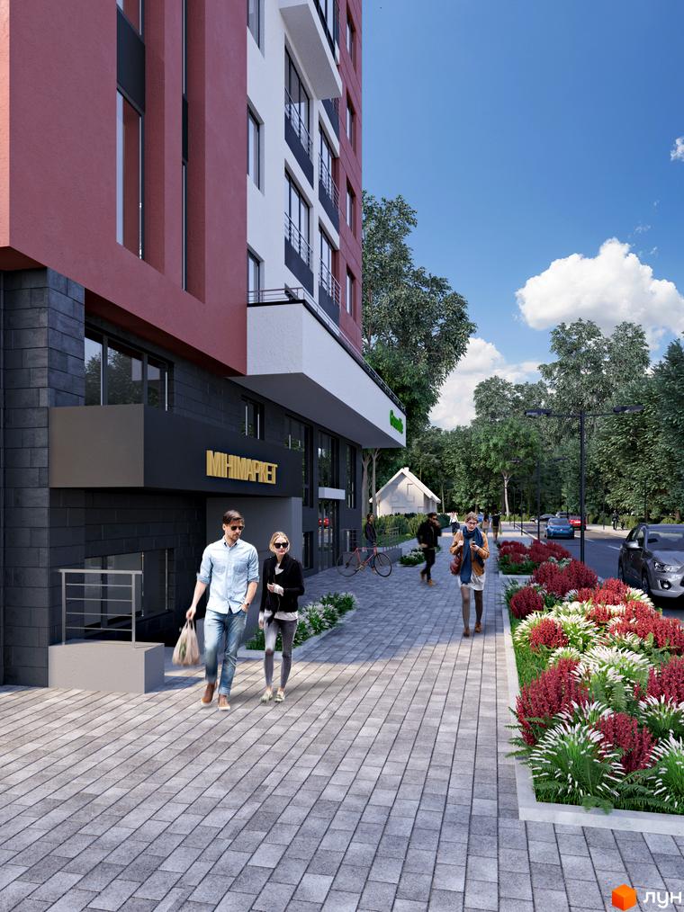 Новобудова ЖК Green Life-3 з червоним фасадом та сірою плиткою. Поруч доглянута прибудинкова територія з квітами та деревами.