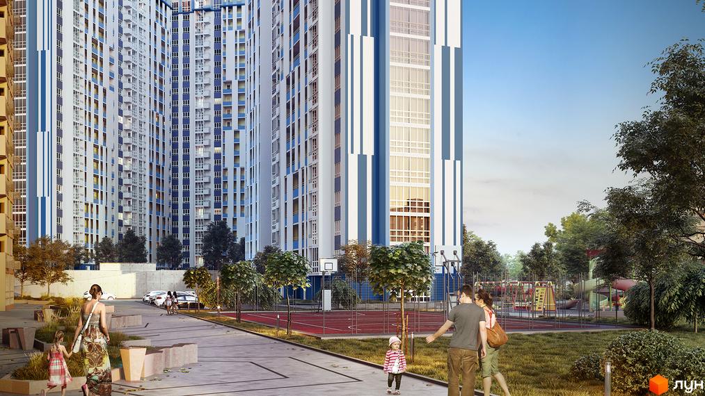 Високі будинки ЖК Злагода з білими та синіми фасадами. На передньому плані доглянута прибудинкова територія з алеями, дитячим майданчиком та спортивним майданчиком.