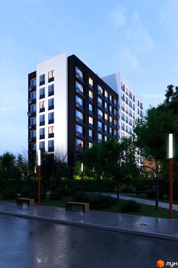 Житловий комплекс Avalon 2Day має багатоповерховий будинок з контрастним чорно-білим фасадом та освітленими вікнами. Навколо будинку видно зелені насадження, вуличні ліхтарі та мокру доріжку.