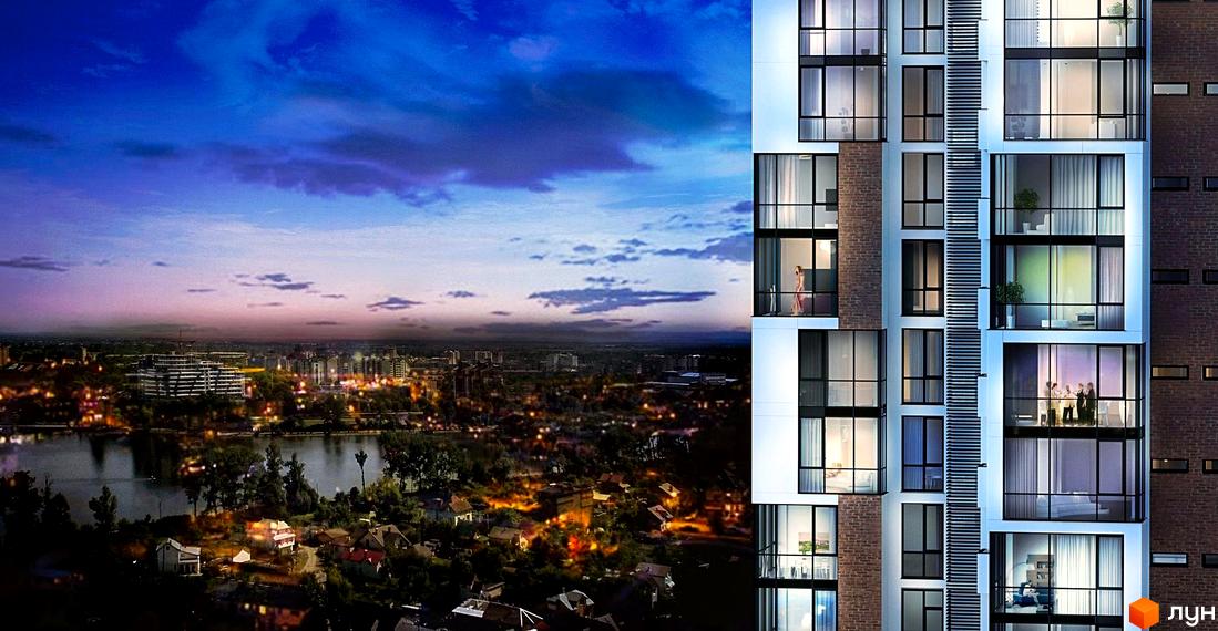 Житловий район Manhattan - це сучасна новобудова з панорамними вікнами та балконами, що відкривають вид на вечірній місто та річку. Комплекс має цегляний фасад та білі елементи дизайну.